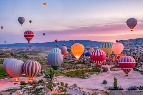 Cover image for the Cappadocia Hot Air Balloon w/ Champagne & Snack experience