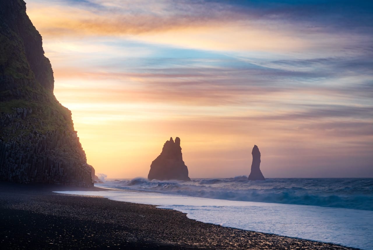 Reynisfjara Beach on a moody day at sunset