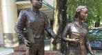 Thumbnail about Teenage boy and girl in 1950s clothing on the way to attend school