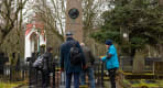 Thumbnail about A group of guests inspecting a monument