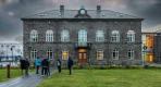 Thumbnail about A group of guests in front of the Icelandic Parliament Building