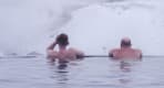 Thumbnail about Two men enjoying the warm water of the Krauma spa's geothermal pool