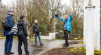 Thumbnail about A Guide from Your Friend in Reykjavik telling a story to guests while visiting the oldest Graveyard in Iceland