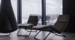 Thumbnail about A picture of two deck chairs sitting inside the Krauma Spa