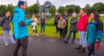 Thumbnail about A group of guests listening to the guide from Your Friend in Reykjavik