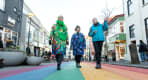 Thumbnail about A group of guests enjoying the cozy atmosphere of Reykjavik while listening to our Guide 