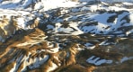 Thumbnail about Landmannalaugar mountains covered with patches of snow