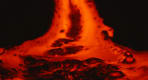 Thumbnail about A close-up view of molten lava bubbling and flowing in vivid shades of red and orange against a dark background, showing its texture and hea