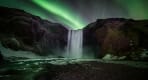 Thumbnail about Beautiful northern lights over Skógarfoss waterfall Iceland