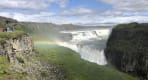 Thumbnail about Rainbow decorated Golden waterfall Iceland
