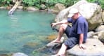 Thumbnail about Traveler at seven-sisters waterfall