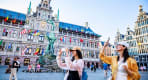 Thumbnail about Our tourists taking pictures of the main Square of Antwerp