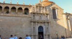 Thumbnail about São Gonçalo Church in Amarante with ornate stone façade, arched cloister, visitors, and golden sunlight