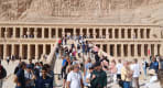Thumbnail about Crowd of tourists on the central incline pathway leading to Hatshepsut temple in Luxor 
