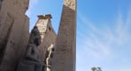 Thumbnail about Front view of Luxor Temple with two colossal statues of Ramses II and the ancient granite obelisk in Luxor, Egypt.