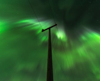 Cover image for the Private Northern lights pickup between Vik and Hveragerði experience