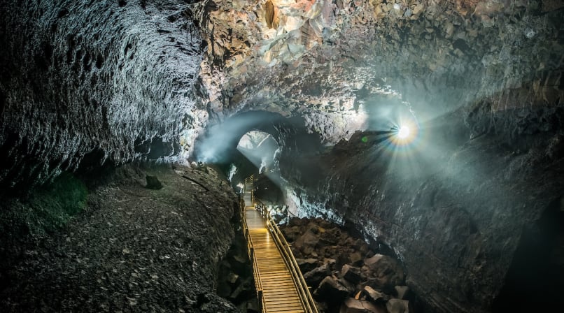 Despite the dark subterranean environment, lighting features provide a wonderful view of the pathway.