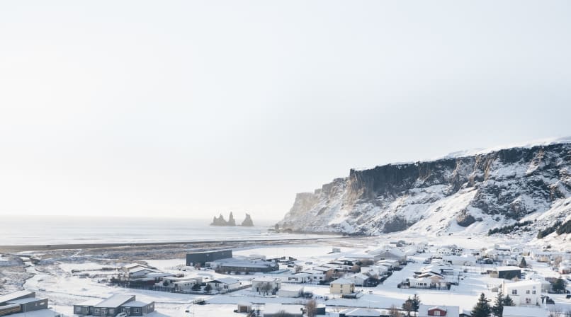 Looking over the village of Vík and Reynisdrangar seastacks