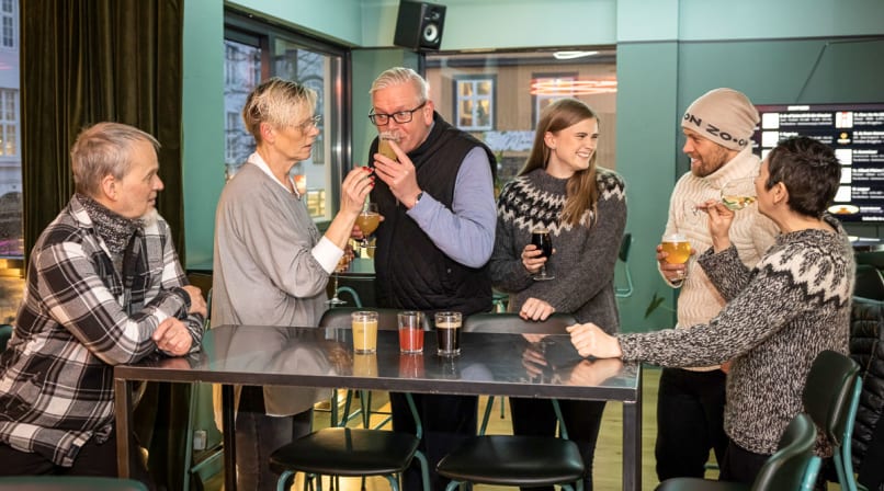 A group of guests sampling different delicious beers during The Reykjavik Beer & Booze Tour