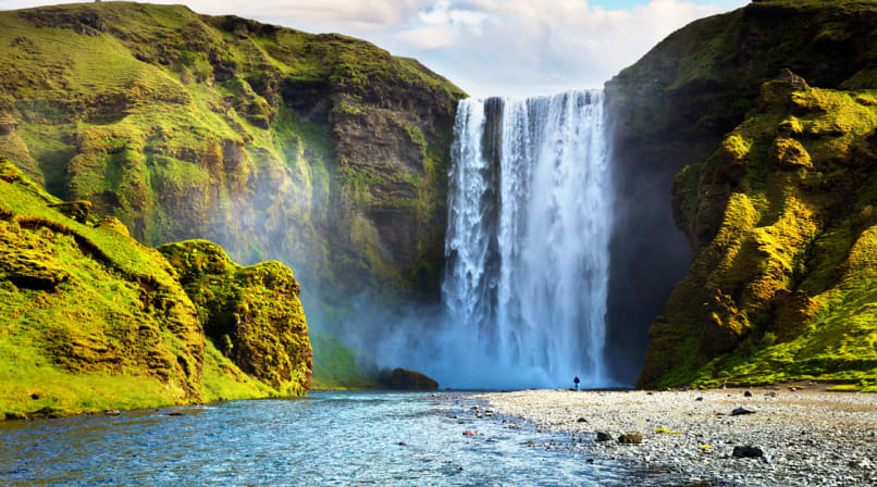 Skogarfoss Waterfall in Summer with Plants