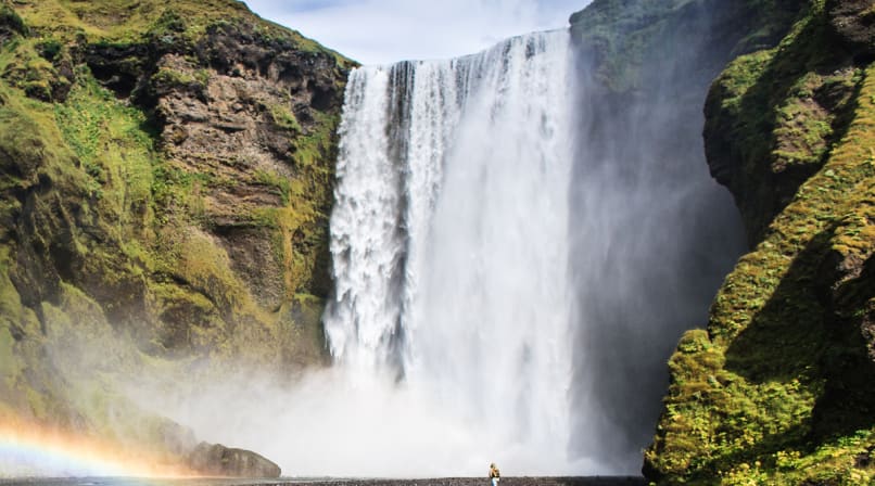 Skogarfoss Waterfall in Summer with Green plants around