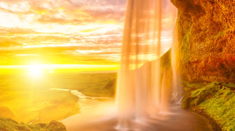 Seljalandsfoss on the South Coast in Iceland. Midnight sun.