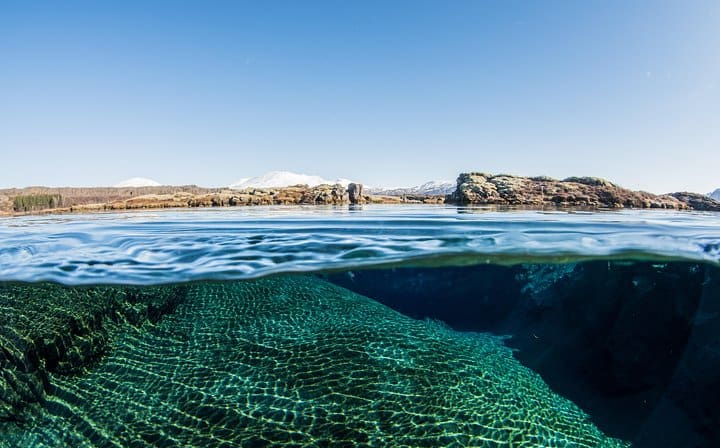 The view above and below in Silfra lagoon