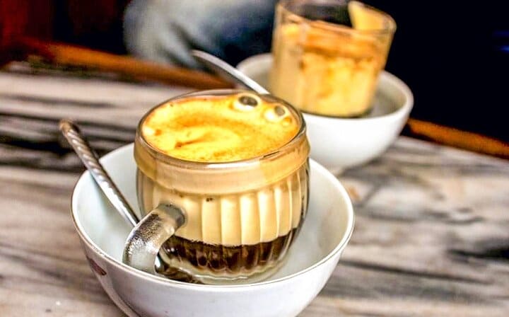 Egg Coffee - a unique Vietnamese drink made with robusta coffee, egg yolks, condensed milk, and sugar.