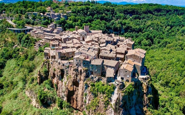Calcata, Bomarzo Monsters private guided tour Rome one day round trip and Thermal Baths of the Popes Pick up, drop off and Tickets inc