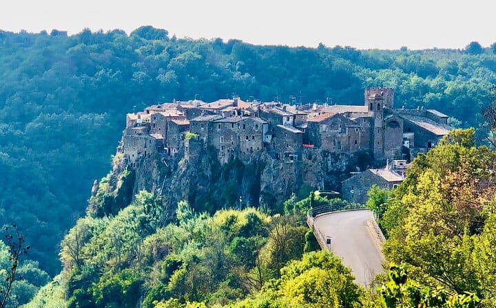 Calcata, Bomarzo Monsters private guided tour Rome one day round trip and Thermal Baths of the Popes Pick up, drop off and Tickets inc