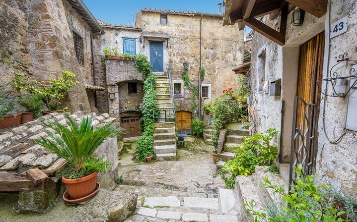 Calcata, Bomarzo Monsters private guided tour Rome one day round trip and Thermal Baths of the Popes Pick up, drop off and Tickets inc
