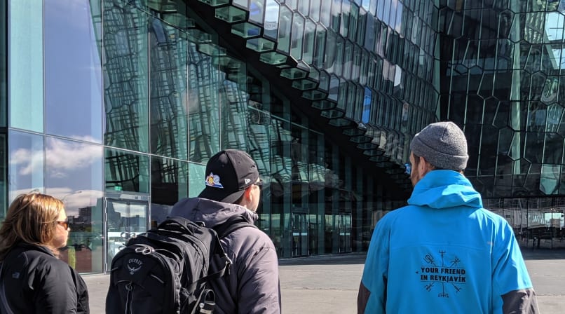 A guide from Your Friend in Reykjavik showing the Harpa Concert Hall to guests