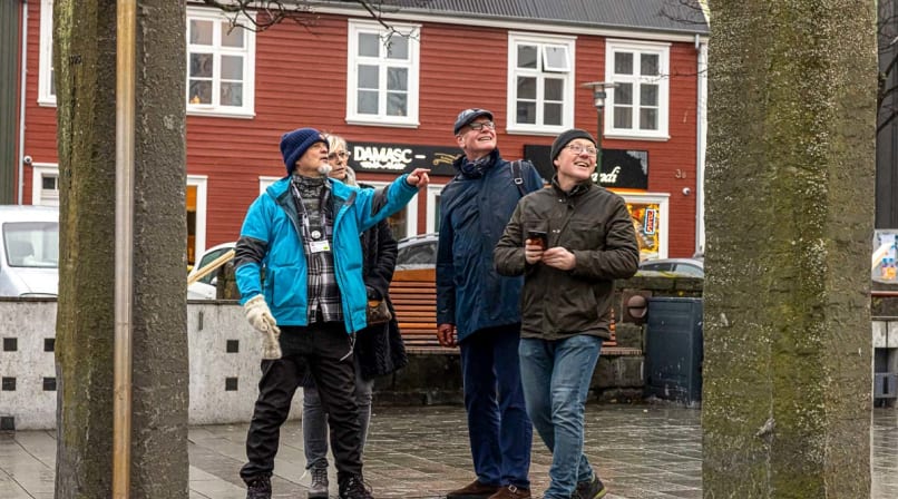 Our expert Guide giving a group of guests insight into the storied history of downtown Reykjavik