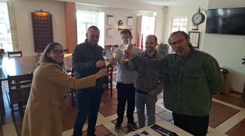 Sharing a toast while enjoying local wines in Bairrada.
