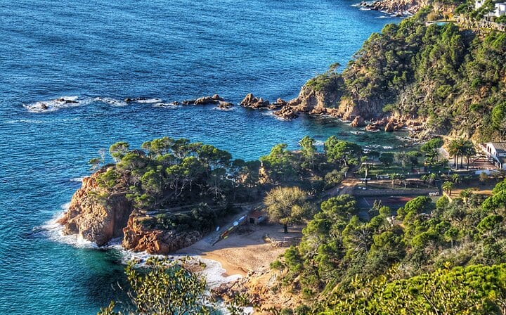 La Costa Brava rugged coastline with hiking trails and swimming spots.