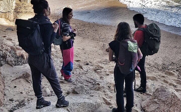 Crossing a beach in Costa Brava.