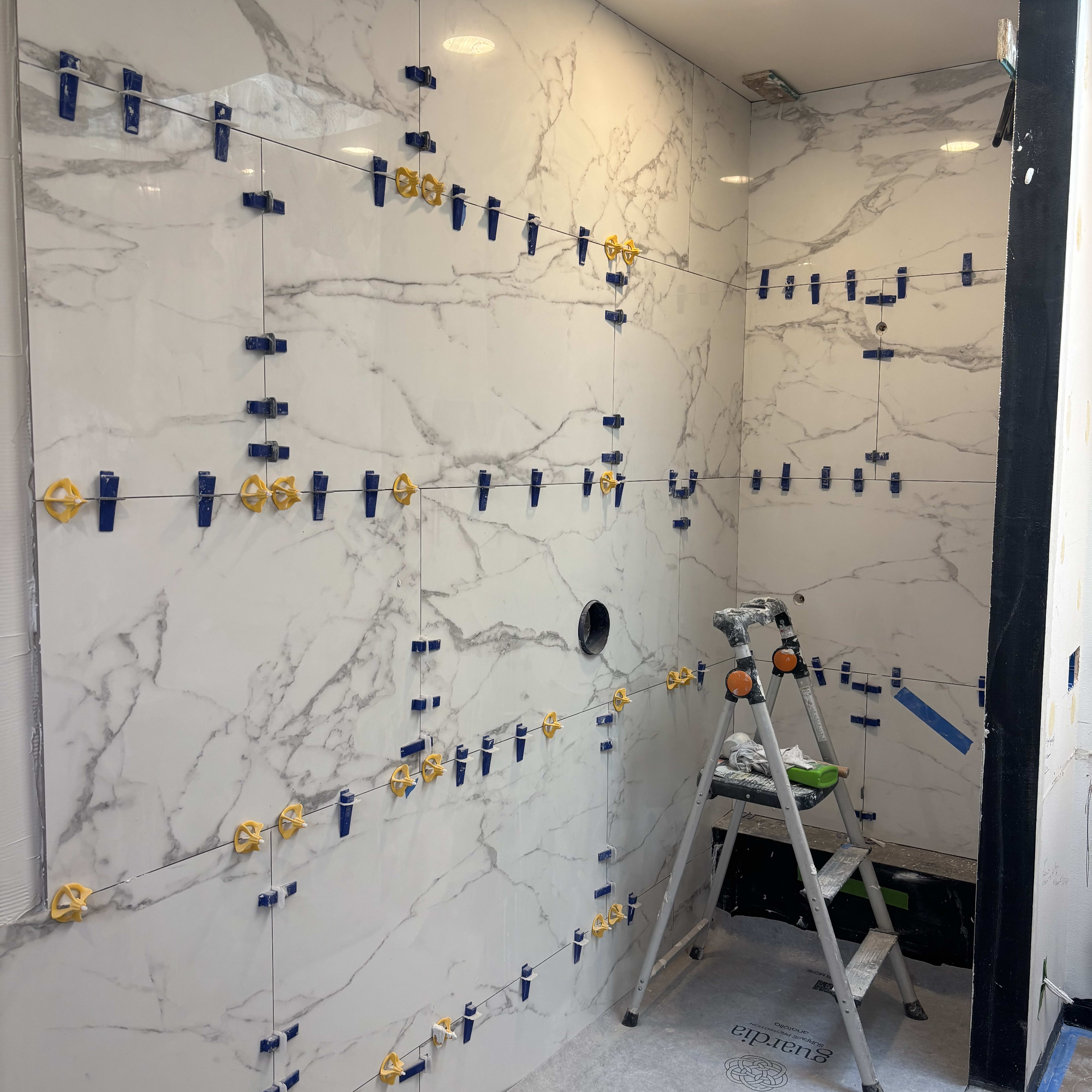 Another shower on the way! We do lots of large format tile. Look at the flow and