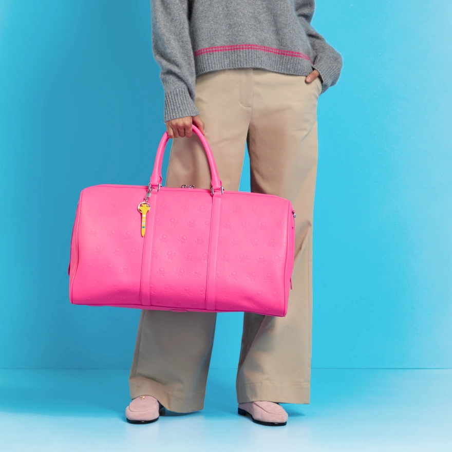 EMBOSSED SKULL & TEES LEATHER WEEKENDER in KNOCKOUT PINK - Alternate Image 1