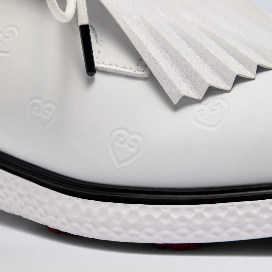 WOMEN'S LTD RELEASE GALLIVAN2R DEBOSSED HEART G'S KILTIE GOLF SHOE in Snow / Onyx - Alternate Image 1