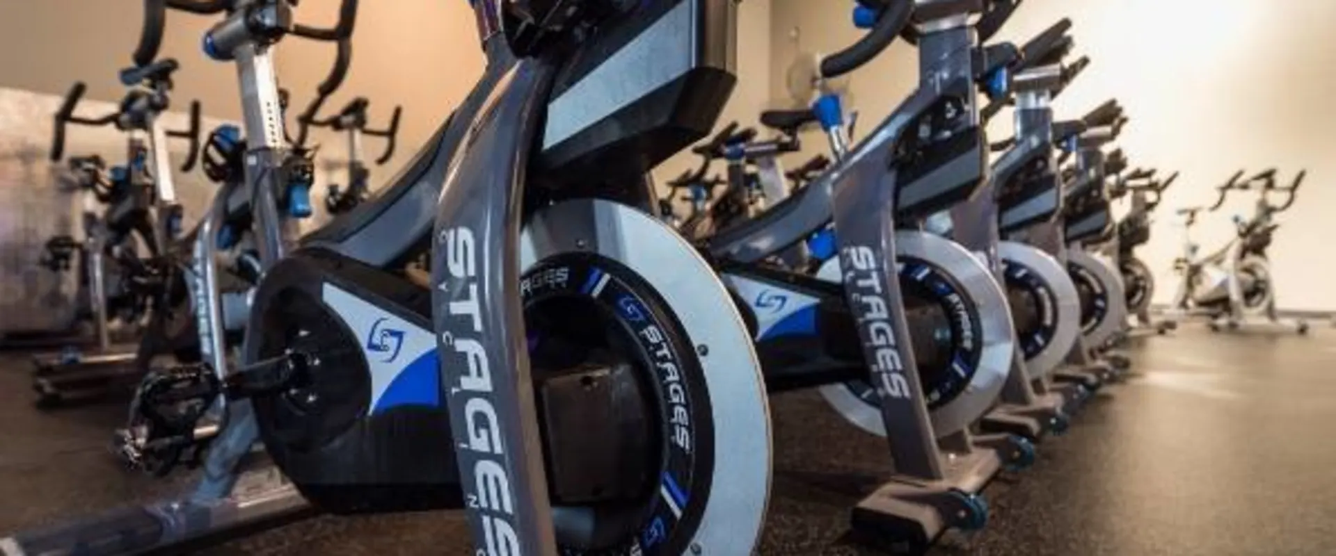 clean modern cycling equipment in gym near me