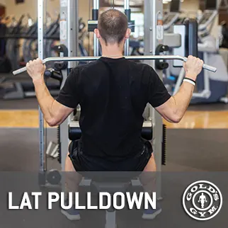 A person in a black shirt is performing a lat pulldown exercise on a weight machine in a gym setting.