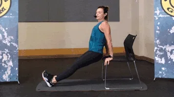 Woman doing chair dip during workout