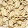A close-up view of a pile of shredded or chopped nuts, with a mix of light and dark brown hues creating a textured, granular appearance.