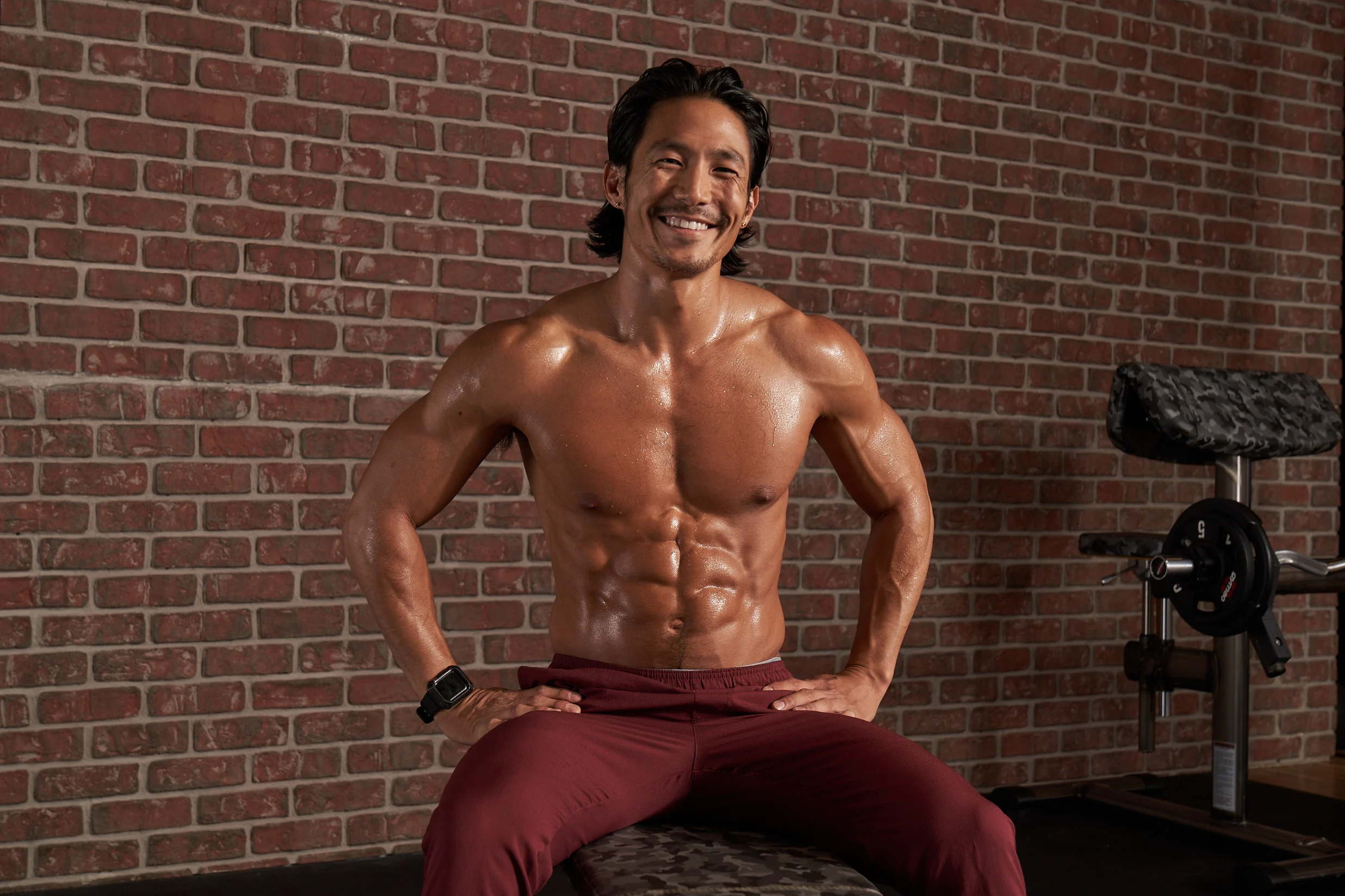 Athlete showcasing core strength after an intense training session