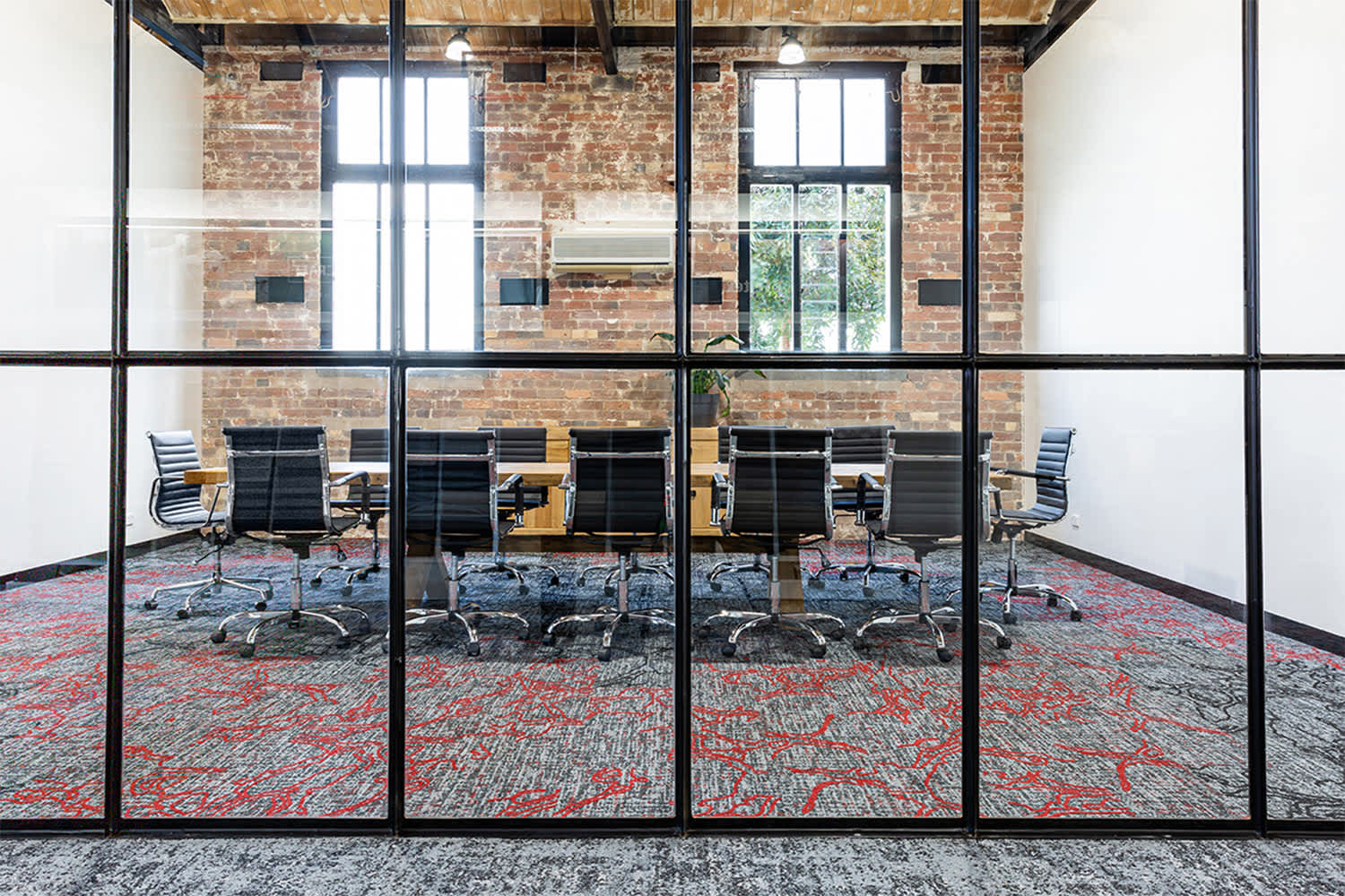 Enhancing Commercial Spaces: The Power of Wayfinding and Zoning with Carpet Tiles