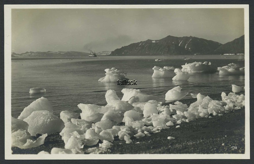 Norway Polar 07: Green Harbour bay. Ice at the shore, tourist cruiser leaving i