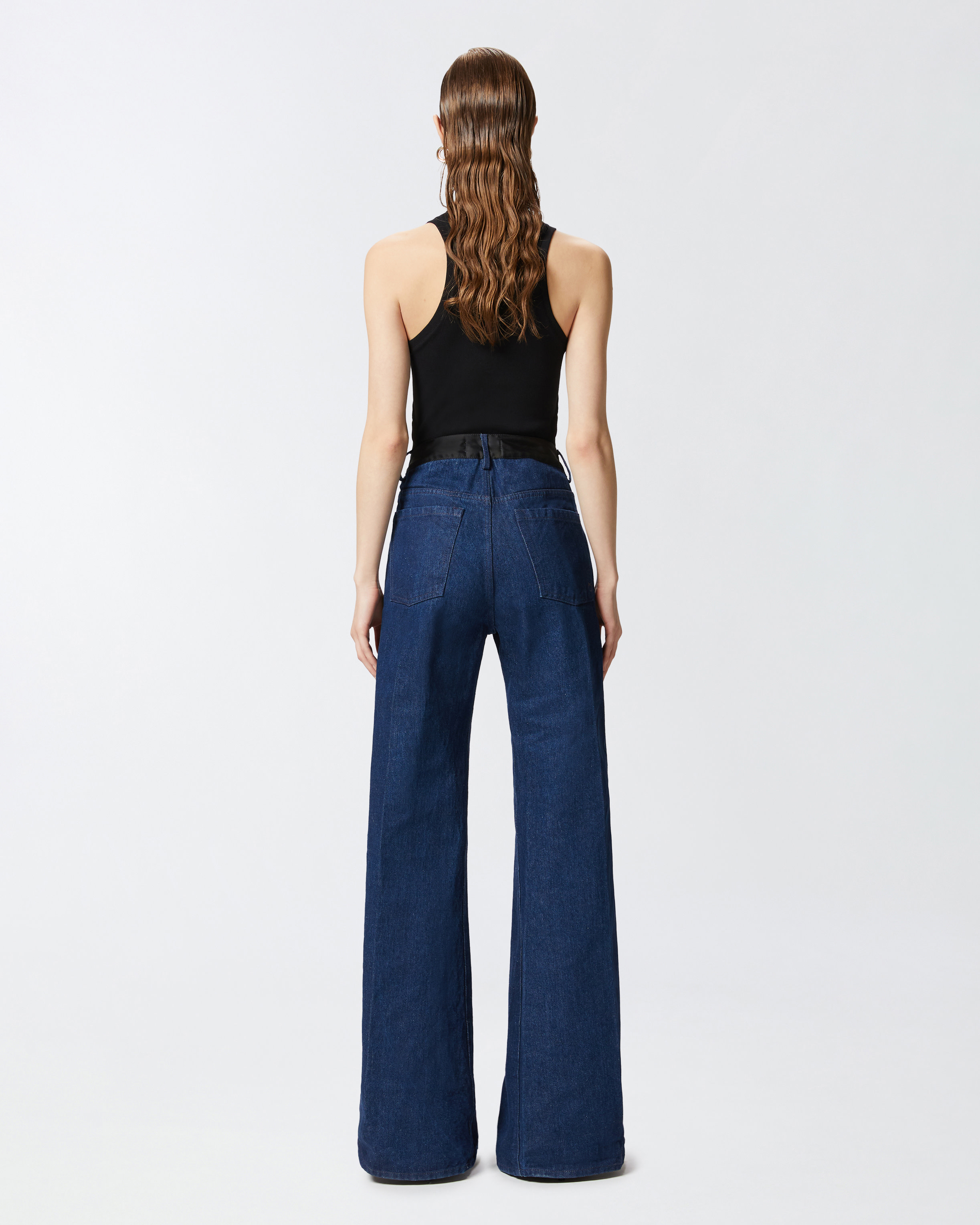 Flared jeans with shiny black satin details PINKO → Shop Online