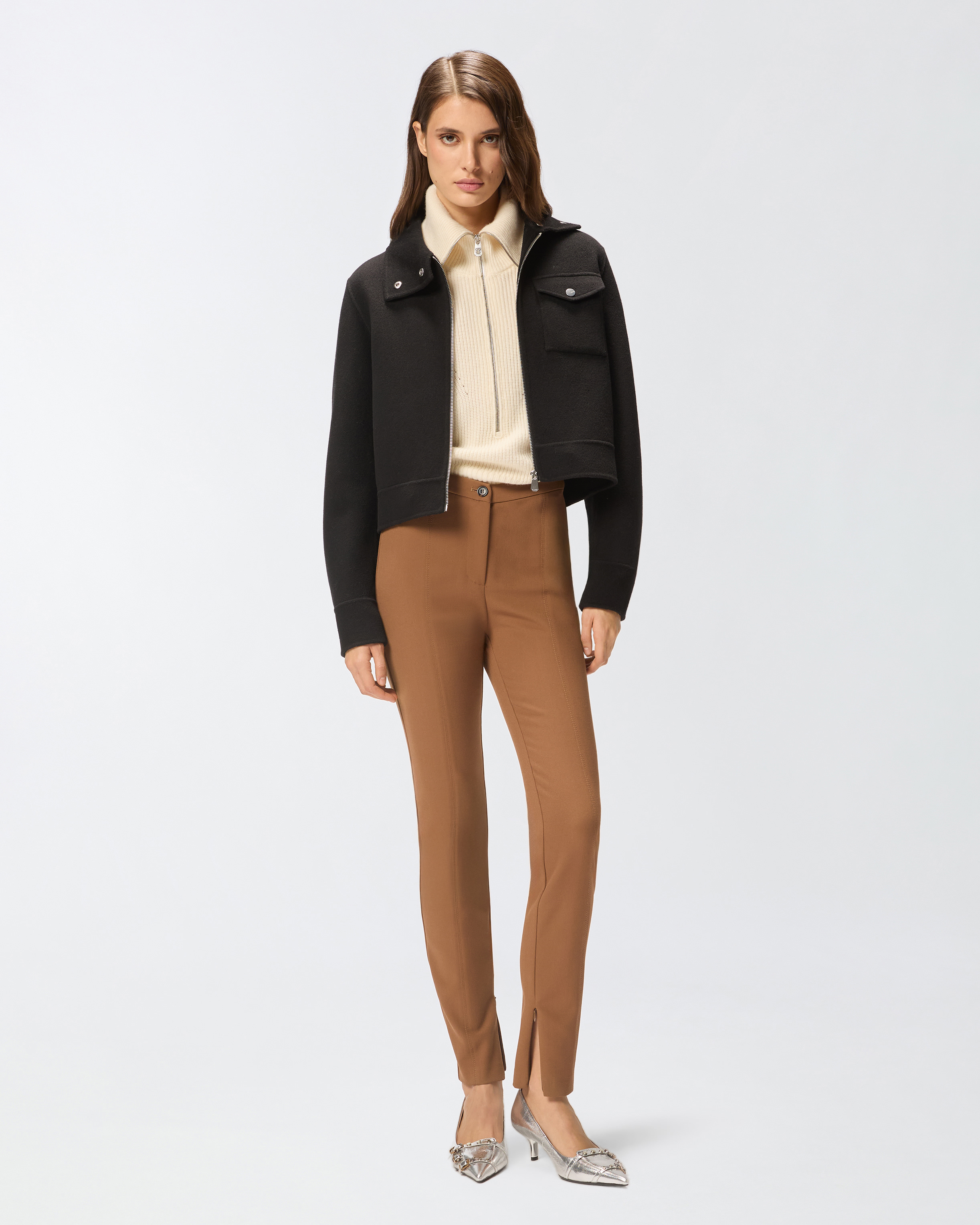 Pantalones skinny con bajo regulable 0