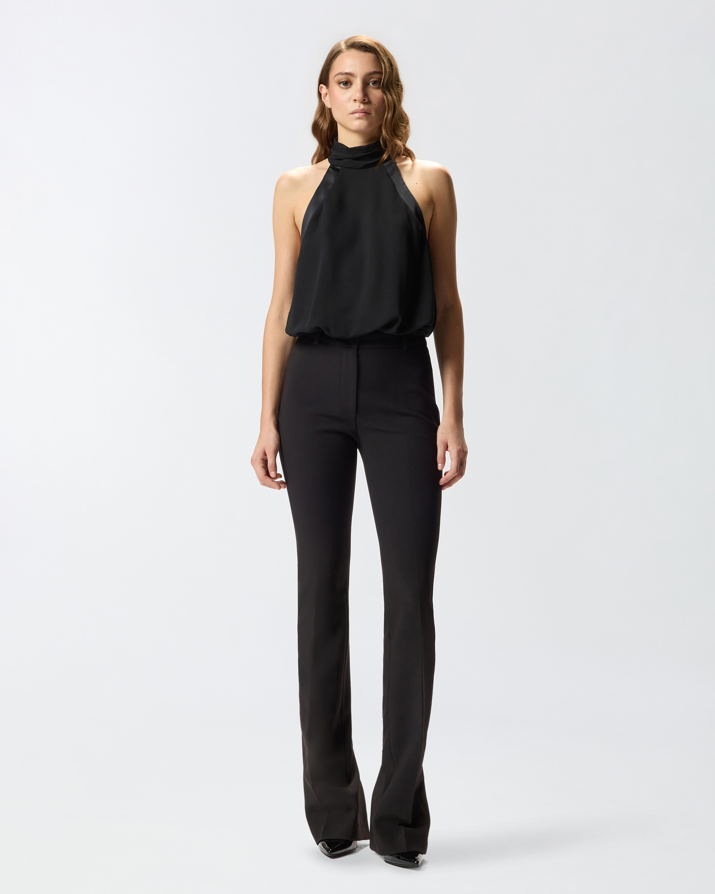 Топ с американской проймой и фигурной прорезью на спинке 1