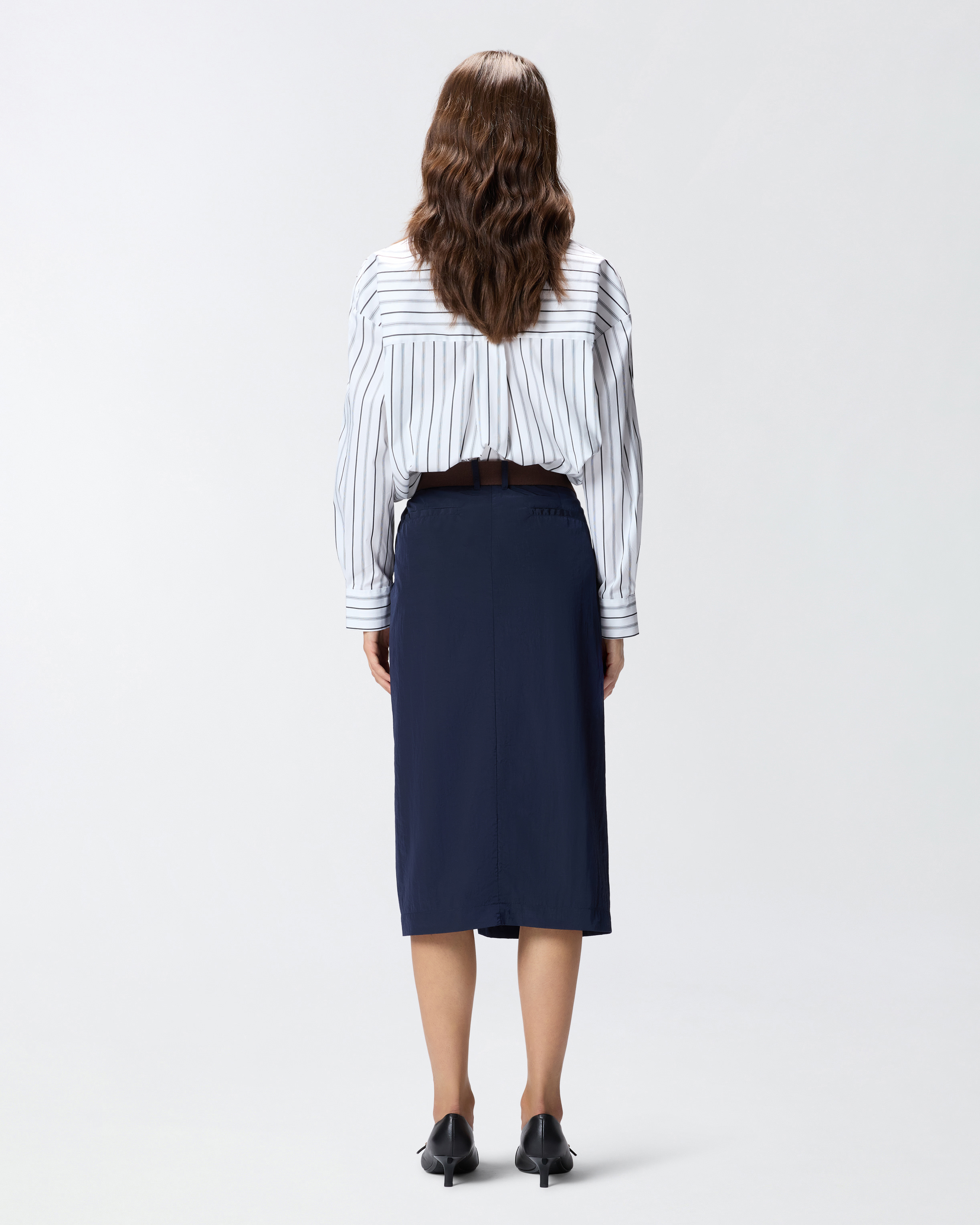Short asymmetrical skirt in technical fabric with belt 2